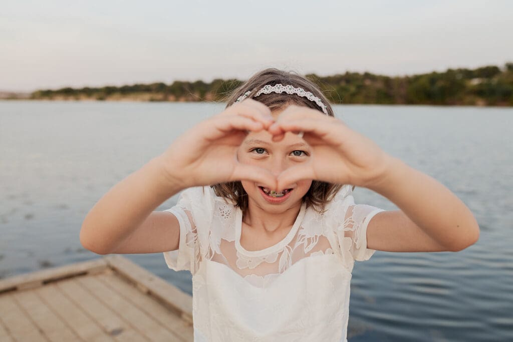 Outdoor baptism photography session with natural light at Brushy Creek Park