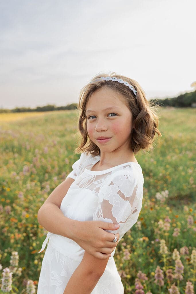 Baptism milestone captured outdoors in Austin by Monica Anahi Photography