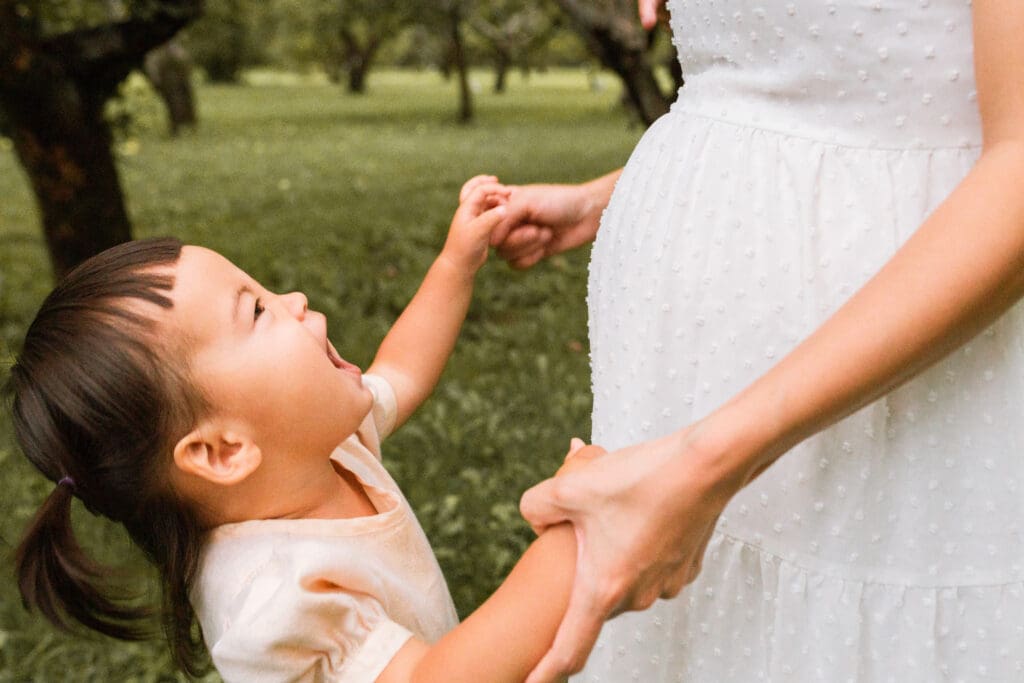 Pregnancy prep tip: choose soft colors for your indoor maternity session