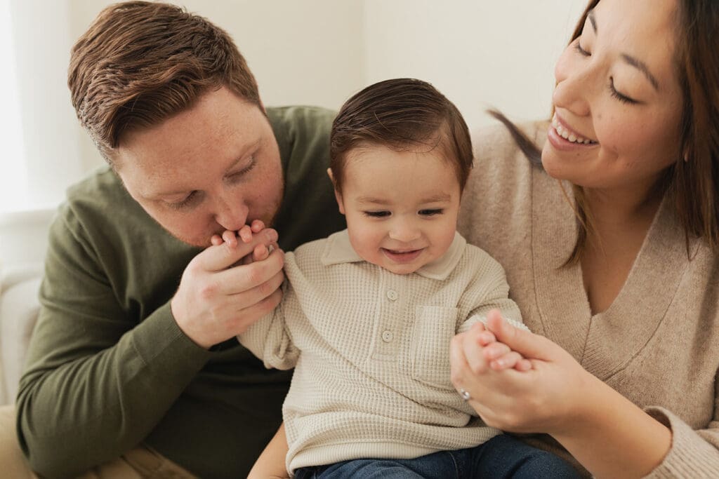 Capturing sibling emotions during indoor maternity photography in Bulverde Texas