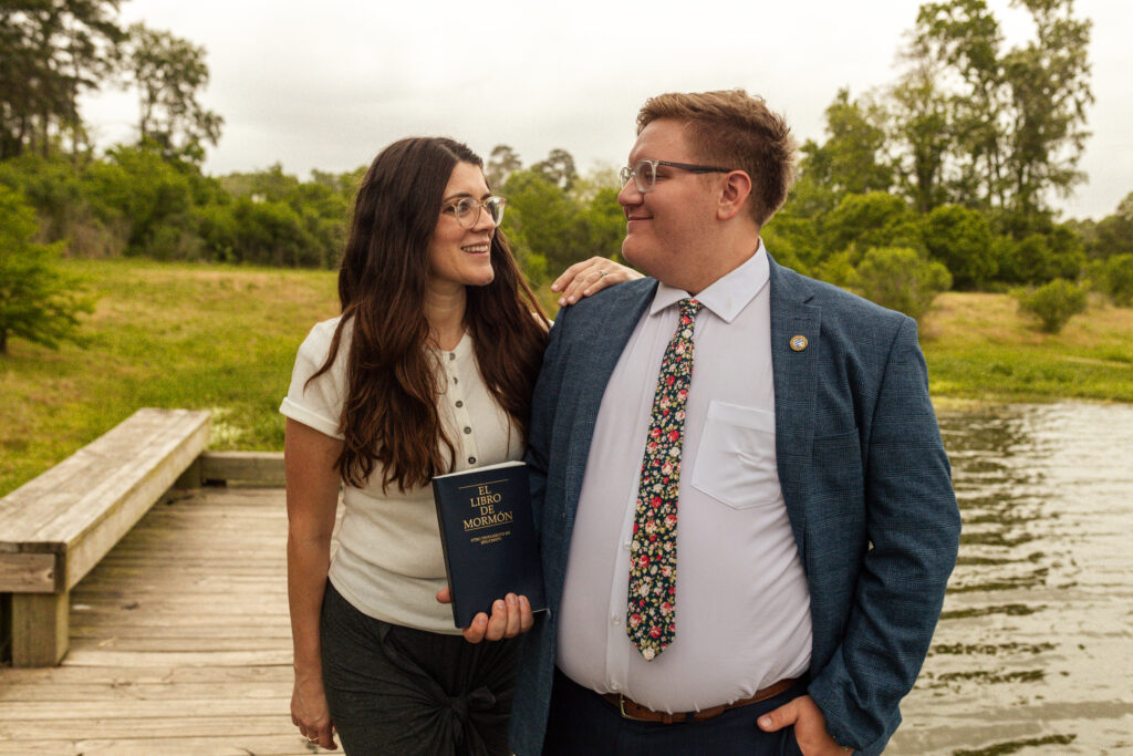 Missionary portrait in formal attire with confident smile and mission tag

