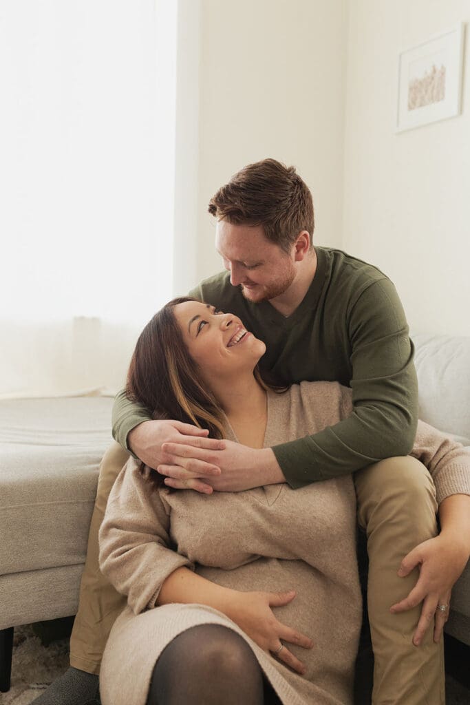 Close-up of baby bump during Bulverde maternity session indoors