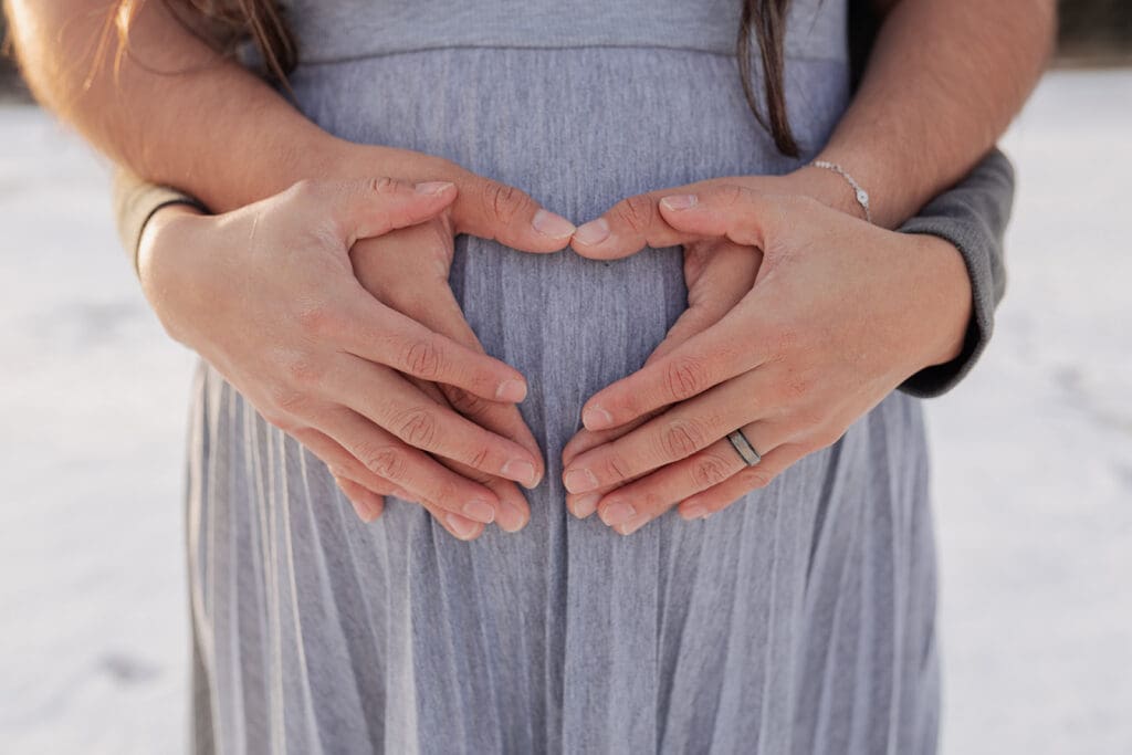 Pregnancy photo shoot prep in beautiful outdoor setting with natural light in Bulverde Texas