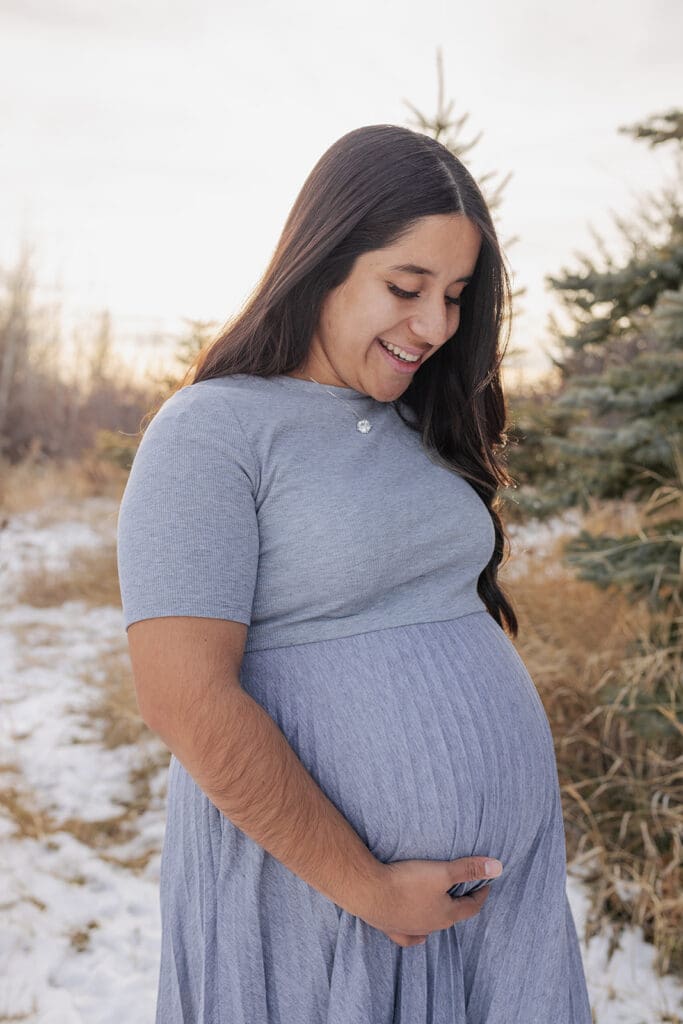 Expecting mom posing during golden hour maternity shoot