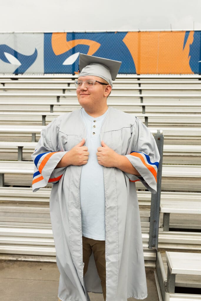 Cap and gown photo during graduation session for Spring, Texas senior

